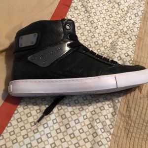G by Guess high top shoes with gunmetal accents.